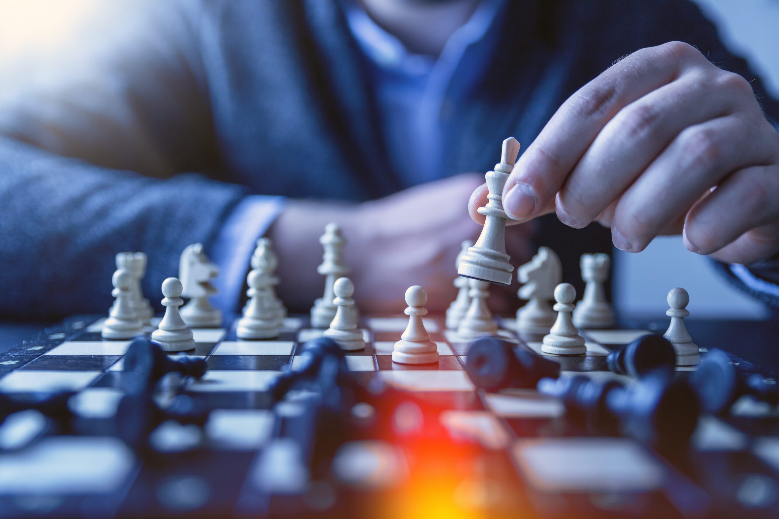 business man playing chess, the best strategy for business growth